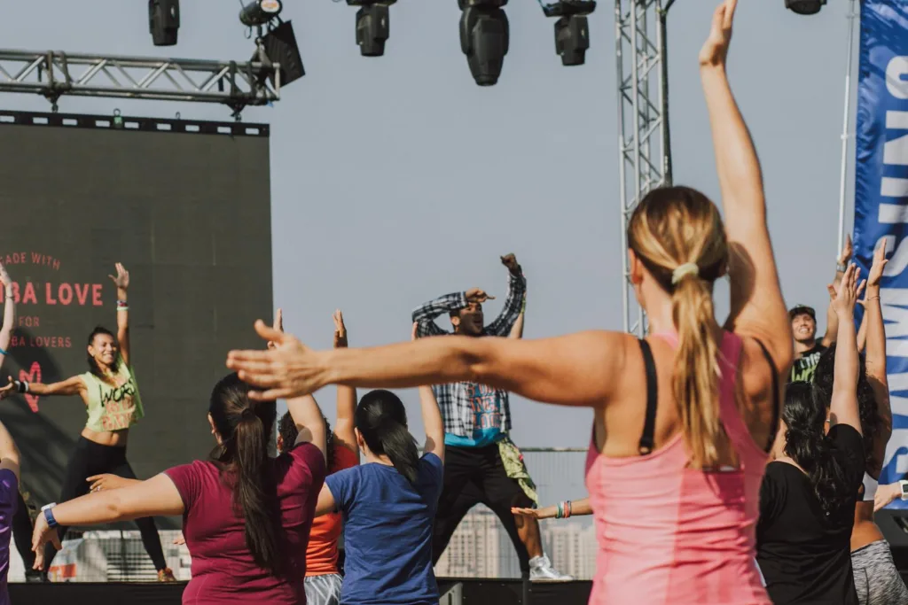 A group of people doing Zumba Aerobic Exercise for weight loss in Chicago