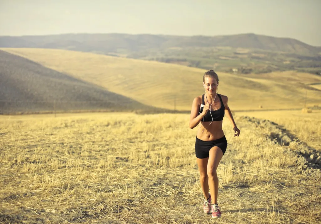 An American woman jogging in the morning, showcasing the importance of exercise as part of a healthy lifestyle for overall well-being.